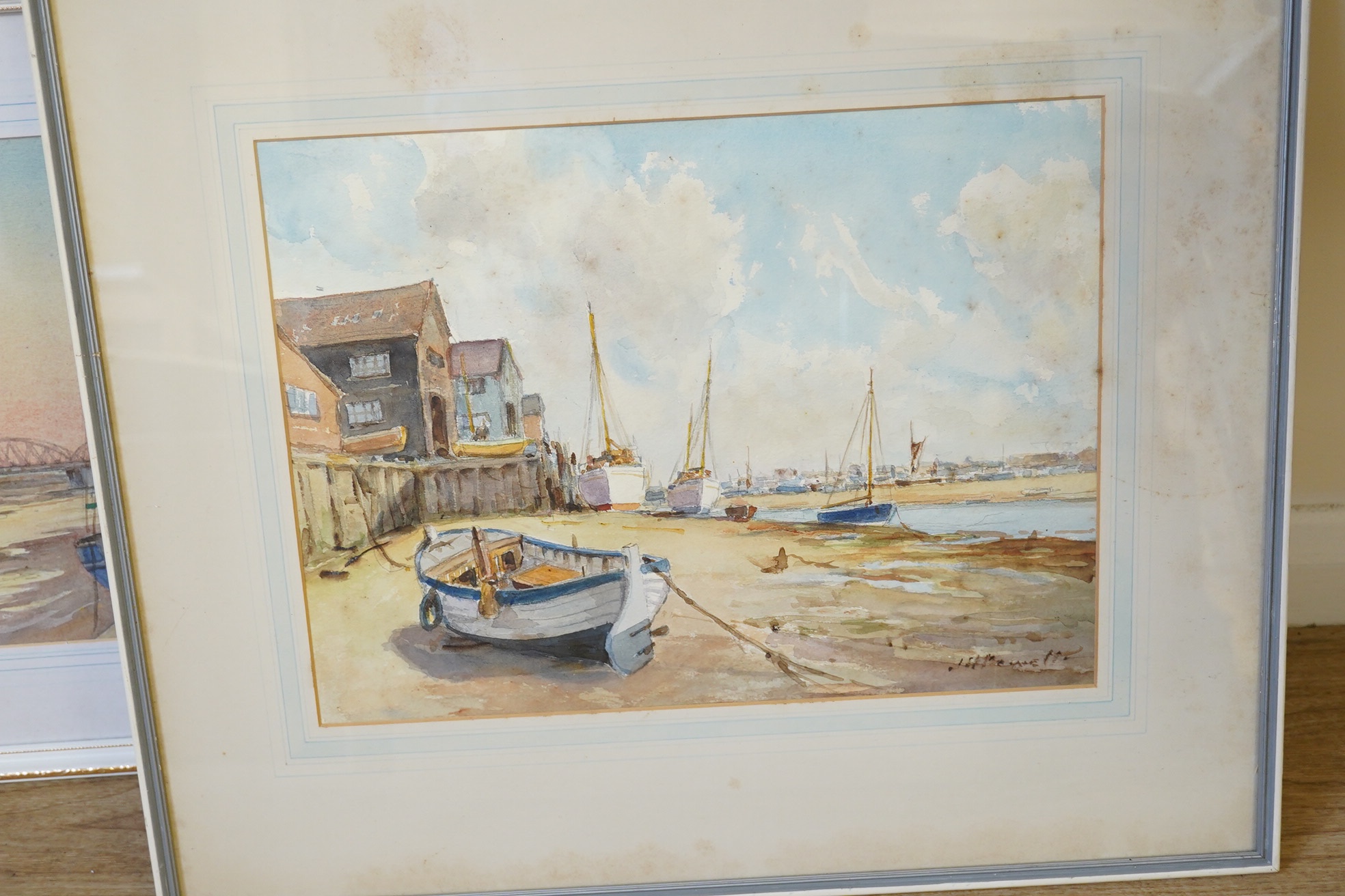 J H Powell (20th. C), three watercolours, Harbour views with moored boats and boats at sea, each signed, largest 27 x 38cm. Condition - poor to fair